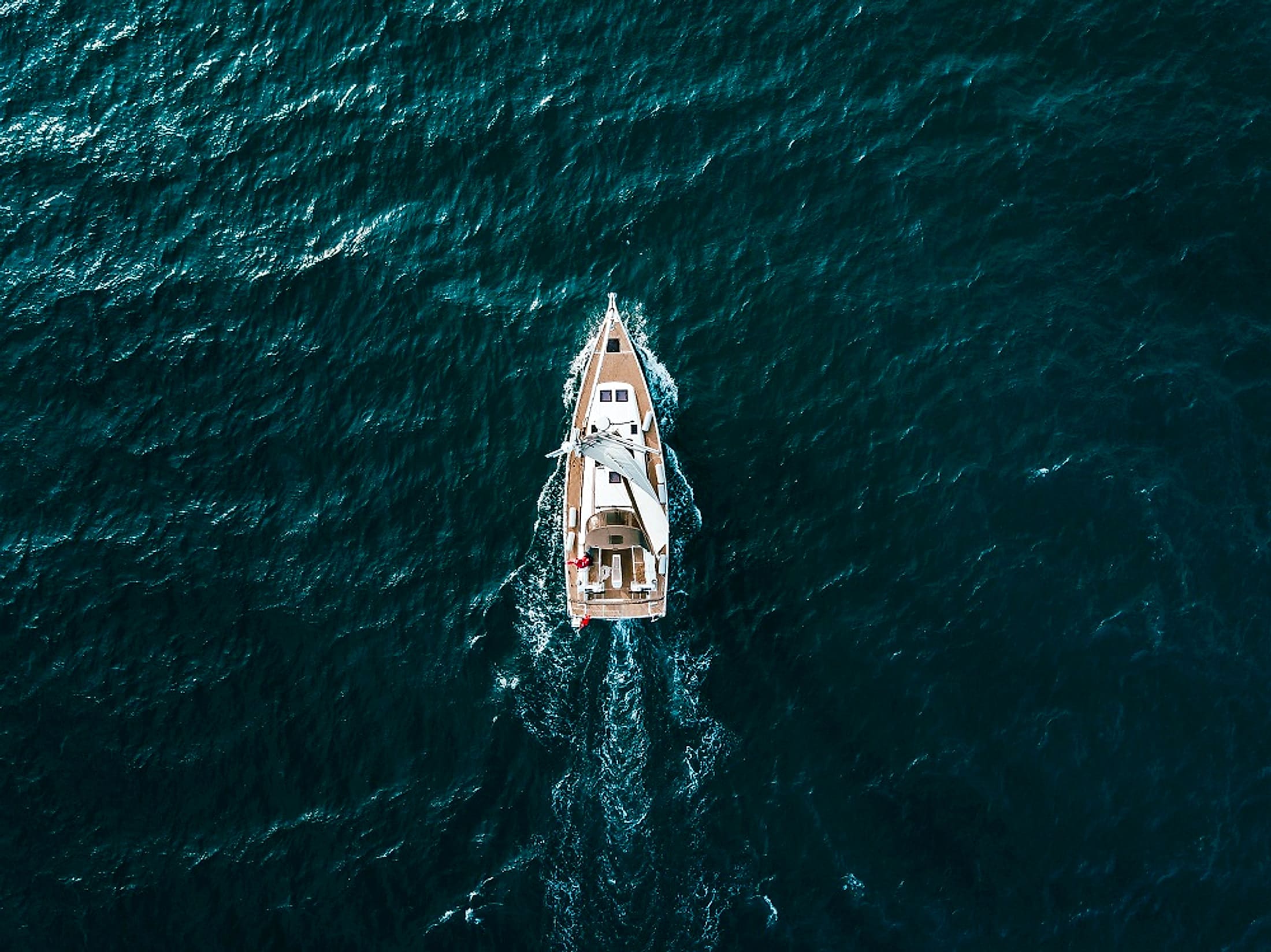 A yacht charting a course across open water